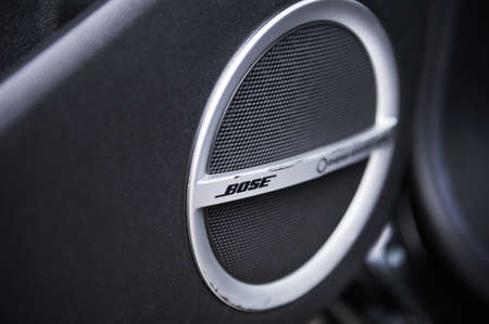Belarus, Minsk-October 6, 2019: Musical speakers of Bose premium audio system in a car door. Close-upのeditorial素材