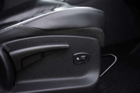 Car interior with buttons for adjusting seat positionの写真素材