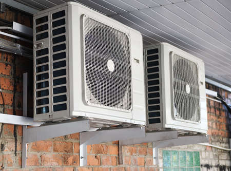 Air conditioner units on the roof of a building. Air conditioning unit.