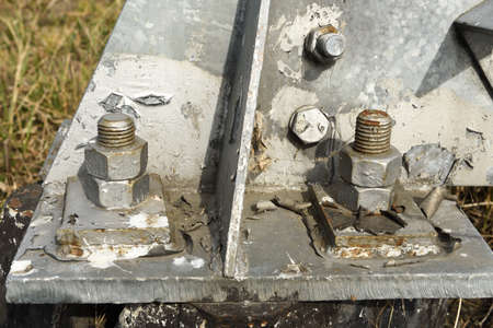 Rusty nut and bolt on the bridge, close-up.