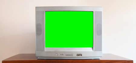 TV with green screen isolated on white background. Chroma key.の写真素材