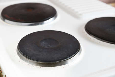 Close-up of two black burners on the gas stove.の写真素材