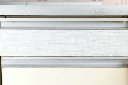 Close up of white wooden door. White wooden door in the kitchen.の写真素材