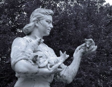 Sculpture of the woman with young foxes. The middle of 20 centuries.          の写真素材