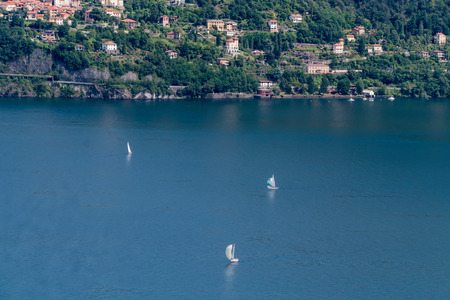 A landscape showing Italy and Switzerland with mountains in the backgroundの写真素材