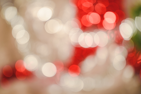 Bright round vivid christmas and new year decoration ornament bokeh red and silverの写真素材