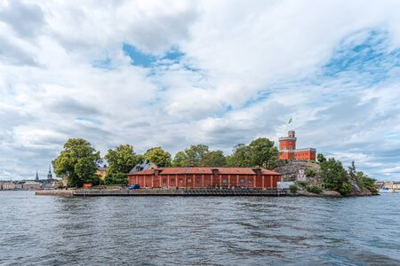 Stockholm, Sweden - August 4, 2019: View of Stockholms island Skeppsholmen from the gulfのeditorial素材