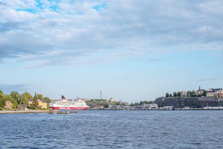 Wiev on coastline of Sodermalm island with ferry Vikingのeditorial素材