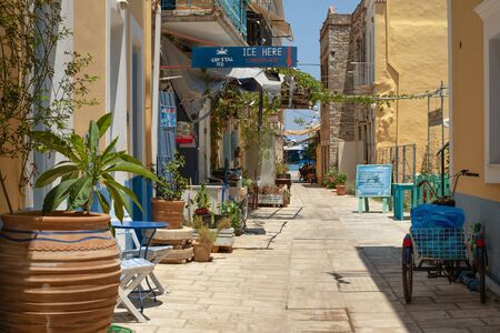 View of bright blue and yellow streets of Symi Island, Greeceのeditorial素材