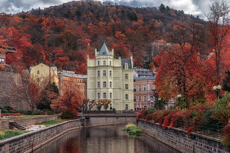 KARLOVY VARY CZECH REPUBLIC - OCTOBER 30, 2019: Wiev on the Tepla river, trees and buildings in Karlovy Vary the most famous SPA town in the Czech Republicのeditorial素材