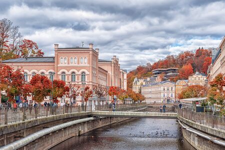 KARLOVY VARY CZECH REPUBLIC - OCTOBER 30, 2019: View on the Tepla river, trees and buildings in Karlovy Vary the most famous SPA town in the Czech Republicのeditorial素材