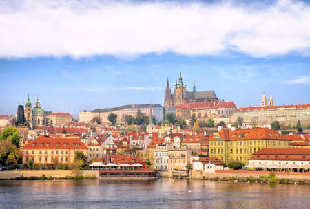 Prague, Czech Republic - October 25, 2019: Panorama of the old part of Prague from the Old Town Bridge Tower. Beautiful view on the bridge over the river Vltava, district Hradcany and Prague Castle.のeditorial素材