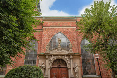 Stockholm, Sweden - August 8, 2019: St. Gertrude's German Church dating to the Middle Ages, with striking stained glass a baroque interiorのeditorial素材