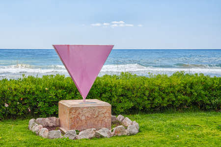 Sitges, Spain - April 29, 2018: Monument to the memory of the LGBT victims in Nazi Germany, pink triangleのeditorial素材