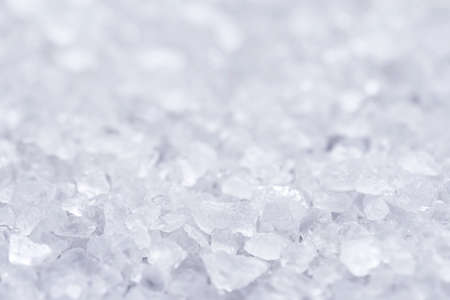 Flat lay small depth of focus background from sea salt, above viewの写真素材