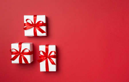 Top view of gift boxes on color background.