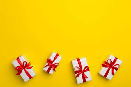Top view of gift boxes on color background.