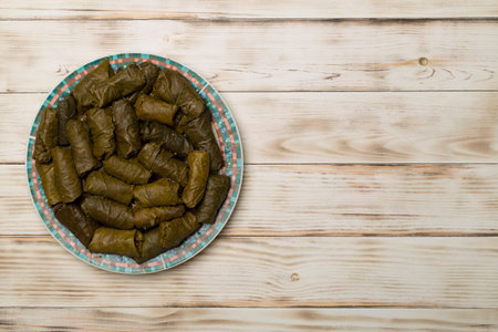 Delicious dolma on wooden table background, top view.の写真素材