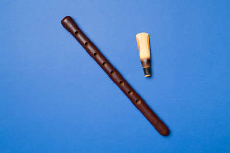Armenian national musical instrument duduk on color background. top view.の写真素材