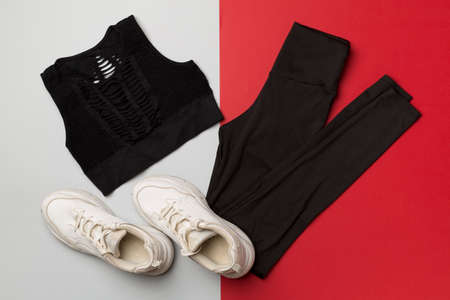 Flat lay composition with sport clothes on color background, top view.の写真素材