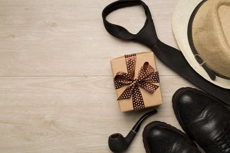Father's Day accessories on wooden background, top view.の写真素材