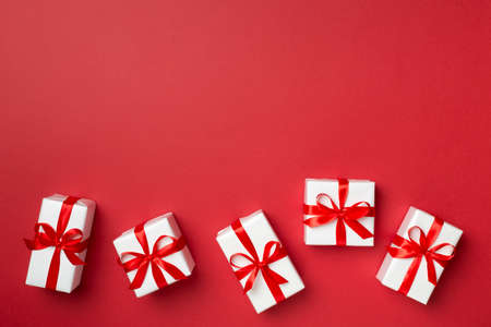 Top view of gift boxes on color background.の写真素材