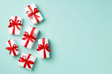Top view of gift boxes on color background.の写真素材