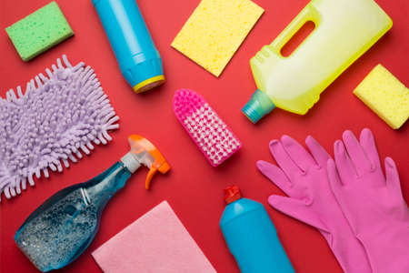 Many different house cleaning products on color background, top view.の写真素材