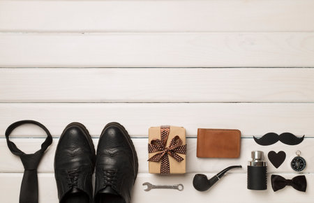 Father's Day accessories on wooden background, top view.の写真素材