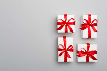 Top view of gift boxes on color background.