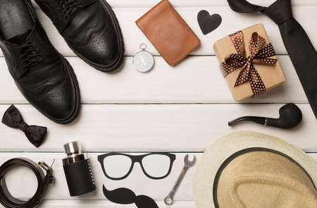 Father's Day accessories on wooden background, top view.の写真素材