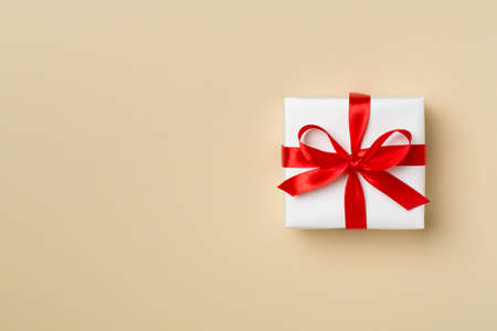 Top view of gift box on color background.の写真素材