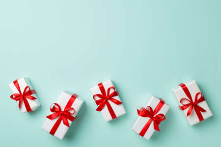 Top view of gift boxes on color background.