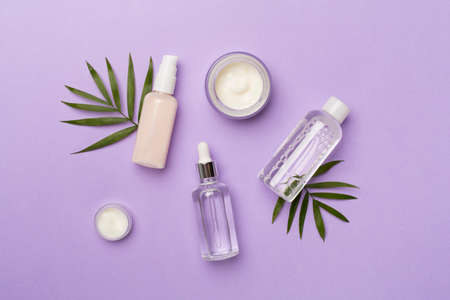 Natural facial cosmetic products on color background, top view.の写真素材