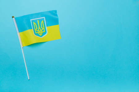 Ukraine flag on color background, top view.の写真素材