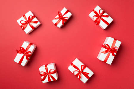 Top view of gift boxes on color background.の写真素材