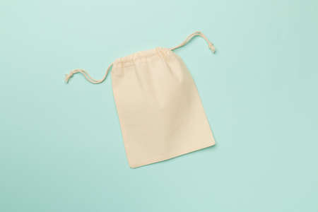 Small eco sack on color background. top view.の写真素材