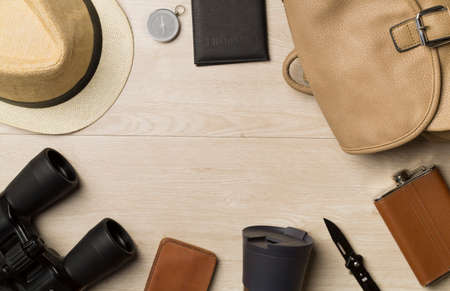 Travel accessories for mountain trip on wooden background, top view.の写真素材