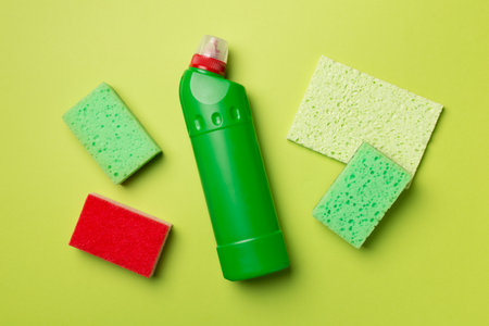 House cleaning products on color background, top view.の写真素材