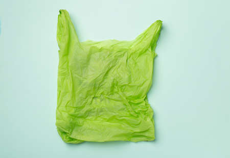 Disposable plastic bag on color background, top view.の写真素材