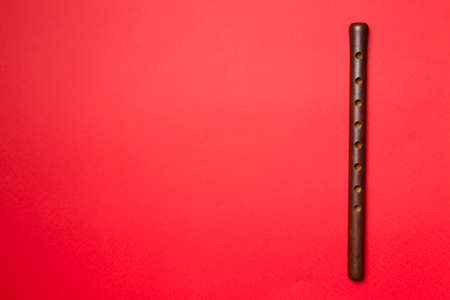 Armenian national musical instrument duduk on color background. Top view.の写真素材