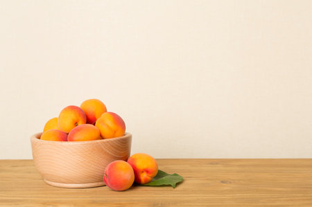 Composition with ripe apricots on wooden table.の写真素材