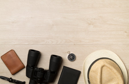 Travel accessories for mountain trip on wooden background, top view.の写真素材