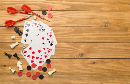 Different board games on wooden background, top view.の写真素材
