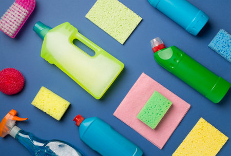 Many different house cleaning products on color background, top view.の写真素材