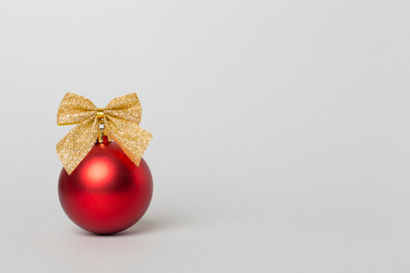 Christmas ball toy on color background.の写真素材