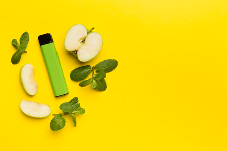 Disposable electronic cigarettes with fruits on color background, top view