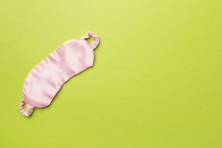 Sleeping eye mask on color background.の写真素材