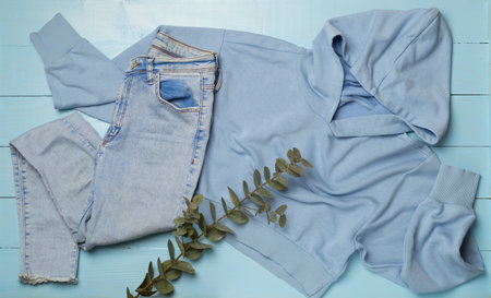 Flat Lay with women casual outfit on wooden background, top viewの写真素材