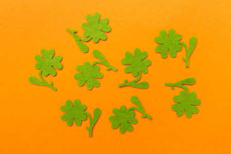 Felt clover on color background, top view. St. Patricks day conceptの写真素材